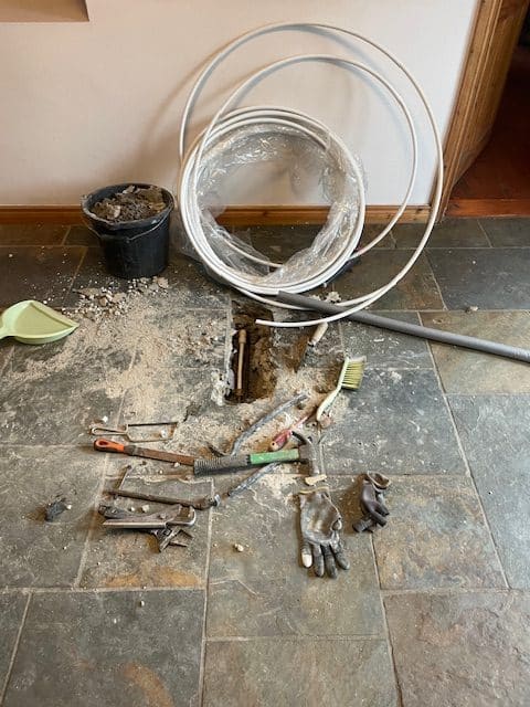 Find leak under tiled floor
